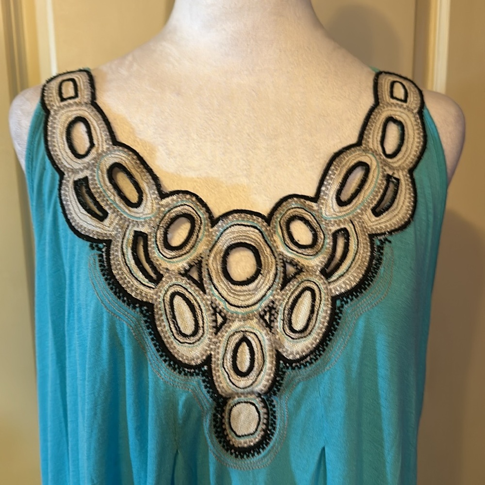 Cleo petite turquoise A line top w/ cut outs around neck gently worn